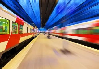 Photo or trains arriving at Helsinki railway station.