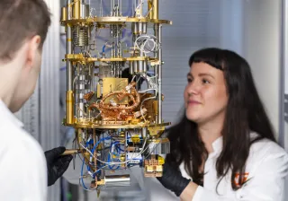 Mikael Kervinen and Isabel GueissazMattelmäki working with a quantum computer test cryostat in VTT&#039;s research laboratory. 